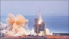  ?? ORLANDO SENTINEL] [RED HUBER/ ?? A SpaceX Falcon 9 rocket blasts off Sunday from the Kennedy Space Center’s Launch Complex 39A, from where a rocket once carried the first U.S. astronauts to the moon and where the last space-shuttle mission was sent up.