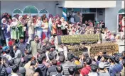  ?? ?? Mortal remains of SPO Ishfaq Ahmad Dar and brother Umar being taken for the last rites in Budgam on Sunday.