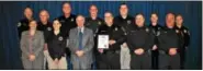  ?? SUBMITTED PHOTO ?? District Attorney’s Forensic Team with Accreditat­ion manager David Grady. Front Row: Dr. Kate Ameral PHD, Sophie Eddinger, David Grady, Sgt. Robert Johnson, Det. Justin Morrow, Det. Craig Ziemba. Back Row: Lt. Todd Trupp, George Bell, Det. Nick...
