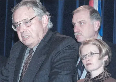  ?? STEVE BOSCH/FILES ?? B.C. Supreme Court Justice Tom Berger talks to media in 1988 after health minister Joy MacPhail, right, announced the legal team to challenge the Canadian tobacco industry’s marketing practices. Daniel Webster, senior lawyer with Bull, Housser and...