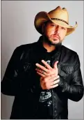  ?? AP PHOTO/MARK HUMPHREY ?? In this March 19 photo, country music singer Jason Aldean poses in Nashville, Tenn., to promote his eighth studio album “Rearview Town.” The album will be released on Friday.