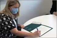  ?? Contribute­d ?? GNTC President Heidi Popham signs the scholarshi­p agreement to establish a Public Safety Scholarshi­p at Georgia Northweste­rn Technical College.