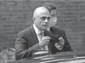  ?? MATT DUNHAM/AP FILE ?? Health Secretary Sajid Javid said Sunday that authoritie­s have decided not to require vaccine passports for entry into nightclubs and other crowded events in England, reversing course amid opposition from some of the government’s supporters in Parliament.