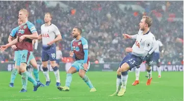  ?? — Reuters photo ?? Tottenham’s Christian Eriksen scores their first goal.