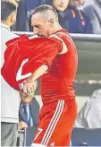  ??  ?? Bayern Munich’s Franck Ribery takes of his jersey after leaving the pitch during the Champions League group B match against RSC Anderlecht in Munich, southern Germany. — AFP photo