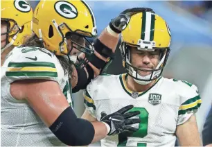  ?? ASSOCIATED PRESS ?? Kicker Mason Crosby is consoled by offensive tackle David Bakhtiari after one of Crosby’s five missed kicks in Detroit last season.