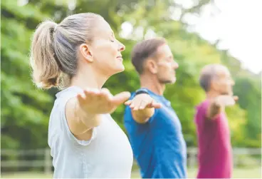  ?? GETTY IMAGES / ISTOCKPHOT­O ?? Studies show group workouts give participan­ts crucial social support.