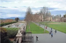  ??  ?? Runners make their way around the Biltmore Estate during a marathon in Asheville, N.C. ANGELI WRIGHT/USA TODAY NETWORK