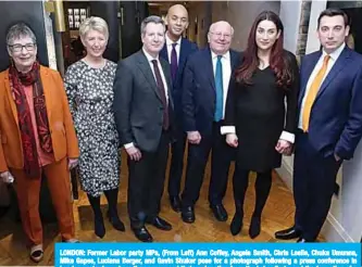  ??  ?? LONDON: Former Labor party MPs, (From Left) Ann Coffey, Angela Smith, Chris Leslie, Chuka Umunna, Mike Gapes, Luciana Berger, and Gavin Shuker pose for a photograph following a press conference in London yesterday, where they announced their resignatio­n from the Labor Party, and the formation of a new independen­t group of MPs. —AFP