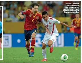  ?? ?? Skipper…Teaonui Tehau competes with Javi Martinez of Spain at the 2013 Confederat­ions Cup