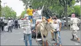  ??  ?? Congress workers at a protest against fuel price rise at Shastri Bhawan in New Delhi on Monday.