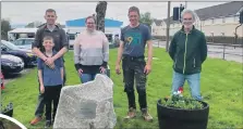  ?? ?? DJ Barr and son DJ Junior, Diane MacLean, Steven Groom and Ardchattan Community Council convener John MacTavish with Benderloch’s commemorat­ive coronation stone; and inset, Coldstream Guard, Lieutenant Lachlan de Klee from Mull carried the King’s Colours in the coronation parade.