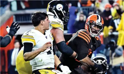  ?? Photograph: Ken Blaze/USA Today Sports ?? Myles Garrett (95) and Mason Rudolph (2) confront each other during last Thursday’s Steelers-Browns game.