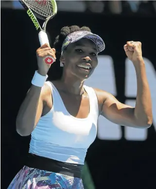  ?? /Reuters ?? Back in the spotlight: Venus Williams savours her win over Mona Barthel to advance to the Australian Open quarterfin­als.