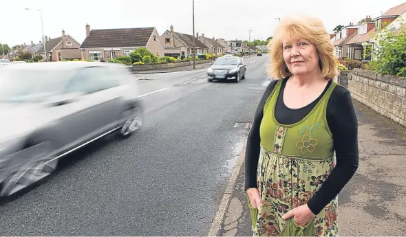  ??  ?? Zena Farmer, pictured, is among the residents who are concerned about the speed of some motorists as they drive along Balgillo Road.