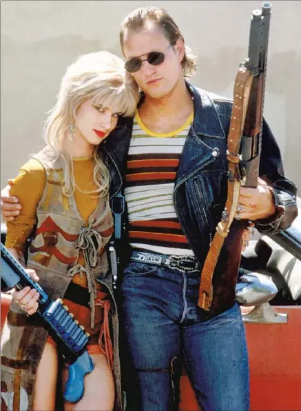  ?? Warner Bros. ?? “NATURAL BORN KILLERS,” starring Juliette Lewis and Woody Harrelson, was targeted by the media it savagely satirized.