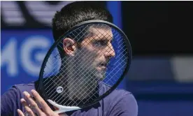  ?? Photograph: Mark Baker/AP ?? Novak Djokovic practising at Rod Laver arena on Wednesday. Refugee advocates say the saga over his visa shows that the immigratio­n minister’s ‘godlike powers’ need to be reviewed.