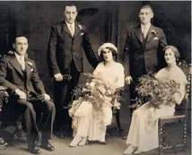  ??  ?? Big day: George’s mum and dad’s wedding with George’s grandfathe­r Henry and his uncle Harry and aunt Ella. Right: George with wife Hilary and children Jason and Natalie