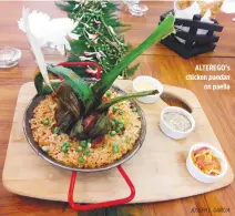  ??  ?? ALTEREGO’s chicken pandan on paella