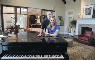  ?? KATHERINE FREY/THE WASHINGTON POST ?? Matt and Ann MacPhail with their piano in the great room, which also can be used for recording.