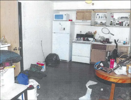  ?? Eighth Judicial District Court records ?? Fifteen people — 13-year old Aaron Jones, his father, stepmother and 12 other children — lived in this 900-square-foot Siegel Suites apartment on Boulder Highway near Sahara Avenue. Authoritie­s say Aaron was killed in the winter of 2017.