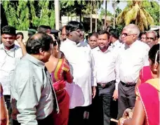  ??  ?? Minister Bathiudeen with Prime Minister Ranil Wickremesi­nghe in Vavuniya yesterday