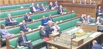  ?? Photo — AFP ?? A video grab from footage broadcast shows Barclay (centre) speaking as he opens the debate on the European Union (Withdrawal Agreement) Bill: Committee of the Whole House debate, in the House of Commons in London.