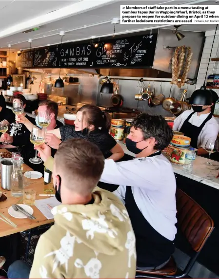  ?? Pictures: Ben Birchall ?? > Members of staff take part in a menu tasting at Gambas Tapas Bar in Wapping Wharf, Bristol, as they prepare to reopen for outdoor dining on April 12 when further lockdown restrictio­ns are eased