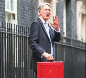  ?? DANIEL LEAL-OLIVAS/AFP ?? British Chancellor of the Exchequer Philip Hammond leaving Downing Street 10 in London on Monday.