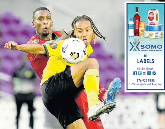  ?? AP ?? Jamaica forward Bobby Reid (front) takes the ball down while challenged by a Surinamese defender during the second half of their Concacaf Gold Cup Group C match in Orlando, Florida, yesterday.