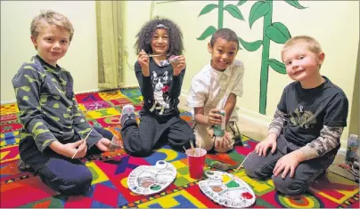  ?? PHOTO SUBMITTED/REBECCA WALKER ?? Clifford Street Youth Centre, through a grant from the Mental Health Foundation of Nova Scotia, has launched a Christmas initiative aimed and positive and community thinking. The program includes painting Christmas rocks. From left are Aaden Francis,...