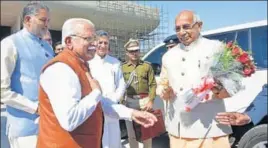  ?? KESHAV SINGH/HT ?? CM Manohar Lal Khattar welcomes Haryana governor Kaptan Singh Solanki before the budget session at the Haryana assembly in Chandigarh on Monday.