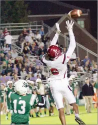  ??  ?? Augusta receiver Jularin Briscoe reaches for a pass while being defended by Episcopal’s Cole Smalling during second-quarter action Sept. 28.