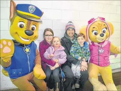  ?? KATIE SMITH/THE GUARDIAN ?? Katie Stordy, Peyton MacCallum, 3, Evan MacCallum and Bentley Bonneville, 3, from Brackley, won VIP passes to the Jack Frost Winterfest this weekend after their photo was selected as a winner for The Guardian’s winter photo contest and got to meet...