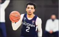  ?? Matt Slocum / Associated Press ?? UConn’s James Bouknight plays against Villanova on Saturday in Villanova, Pa. Bouknight had 20 points and 10 rebounds in the Huskies’ win against Georgetown on Tuesday.