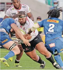  ?? BACKPAGEPI­X ?? CARLU Sadie and his fellow Lions forwards are up against it.
|