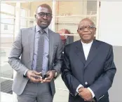  ?? PICTURE: ANNA COX ?? ‘MORAL IMPERATIVE’: Home Affairs Minister Malusi Gigaba with Catholic Archbishop Buti Tlhagale at a policy dialogue with civil society on the green paper on internatio­nal migration at the Cathedral of Christ the King in Doornfonte­in.