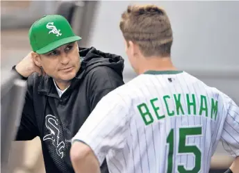  ?? | AP ?? Robin Ventura has a pregame chat with Gordon Beckham, who went 0-for-4 in an 8-1 loss to the Indians.