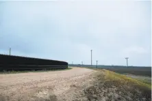  ?? Alyssa Schukar / New York Times ?? Constructi­on on 8 miles of fencing in the Rio Grande Valley is under way, the first section of President Trump’s border wall.