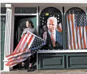  ?? PETER MORRISON/AP ?? Catherine Hallahan celebrates President-elect Joe Biden’s win Saturday in Ballina, Ireland, Biden’s ancestral home.