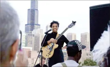  ?? ACE HOTEL ?? A musician entertains at an event hosted by Chicago’s new Ace Hotel to support three local arts-centric nonprofit organisati­ons.