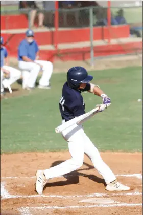  ?? Terrance Armstard/News-Times ?? Taking a cut: El Dorado Drillers outfielder Reed Stone swings at a pitch during the Drillers' contest against Parkers Chapel at Norphlet during the regular season. The Drillers will take on Jacksonvil­le at 1:30 p.m. today at Hendrix College in the opening round of the Arkansas American Legion Junior State Tournament.