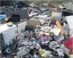  ?? Picture: PA. ?? An illegal fly-tipping site near the Thames estuary in Essex. English councils can now levy on the spot fines.