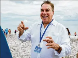  ?? RICHARD GRAULICH / THE PALM BEACH POST ?? Democratic gubernator­ial candidateJ­eff Greene, shown at aJuly release of loggerhead turtles in Juno Beach, went on a buying spree in 2011 that saw him spend more than $200 million on Palm Beach County real estate, but not all of his original plans for the properties have come to fruition.
