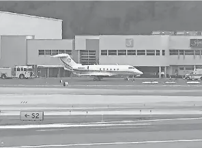  ?? AP ?? A Bombardier Challenger 300 diverted to Bradley Internatio­nal Airport in Windsor Locks, Conn., on Friday afternoon after experienci­ng turbulence in flight. A passenger died after suffering blunt- force injuries.