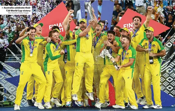  ?? Alex Davidson/Getty Images ?? > Australia celebrate their
T20 World Cup victory