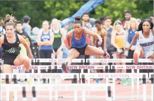 ?? Krista Benson / For Hearst Connecticu­t Media ?? Athletes compete in the 2018 outdoor track State Open at Willow Brook Park in New Britain. What the State Open looks like this year remains to be seen.