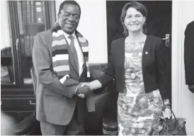  ??  ?? President Mnangagwa welcomes Swiss Ambassador to Zimbabwe Ms Ruth Huber when she paid a courtesy call on him at his Munhumutap­a offices in Harare yesterday. (Picture by Believe Nyakudjara)