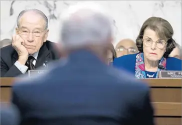  ?? Michael Reynolds European Pressphoto Agency ?? SENS. Charles E. Grassley and Dianne Feinstein listen to Atty. Gen. Jeff Sessions testify on Capitol Hill.