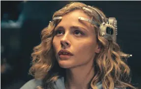  ?? ?? Prime Video
Chloë Grace Moretz plugs into the virtual reality headset of "The Peripheral," a new series on Prime Video starting Oct. 21.